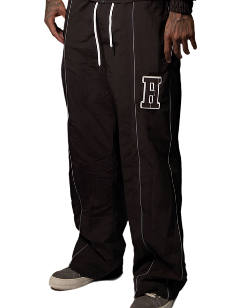 Essential Windbreaker Pants Brown · Forever Hungry 🐮